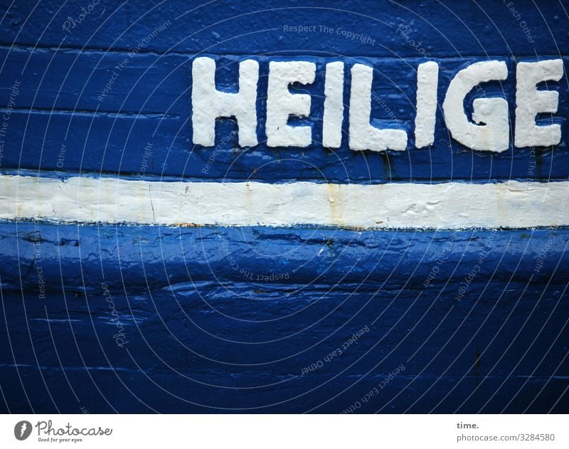 Patriotische Seefahrt | Geschriebenes Hafen Fischerboot Wasserfahrzeug Lack Holz Schriftzeichen Schilder & Markierungen alt dunkel historisch maritim blau weiß