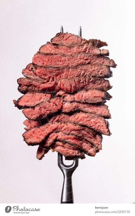Steakscheiben Fleisch Abendessen Gabel Medien Stein dunkel dünn saftig rot schwarz weiß Qualität Metzger Barbecue Rippe Auge Steak Fett grillen selten