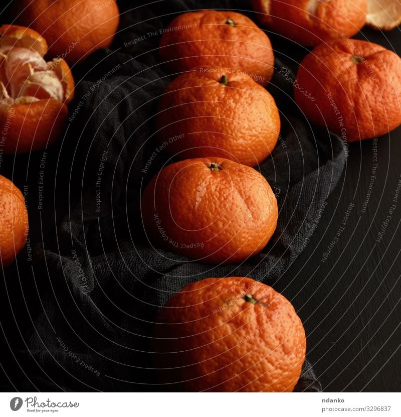 orange-reife Mandarine Frucht Dessert Vegetarische Ernährung Saft Tisch Holz frisch natürlich saftig gelb schwarz Zitrusfrüchte Lebensmittel Hälfte Ernte