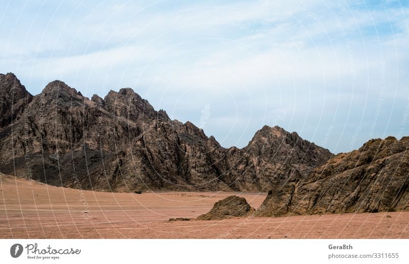 felsige berge in der wüste in ägypten Ferien & Urlaub & Reisen Tourismus Ausflug Sightseeing Sommer Berge u. Gebirge Natur Landschaft Sand Himmel Wolken Klima