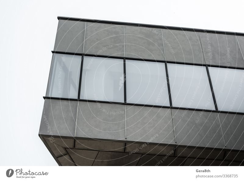 Fragment eines betongrauen Gebäudes mit leeren Fenstern Haus Büro Hochhaus Architektur Straße Stein Beton modern neu trist Gebäudewinkel Appartements Großstadt
