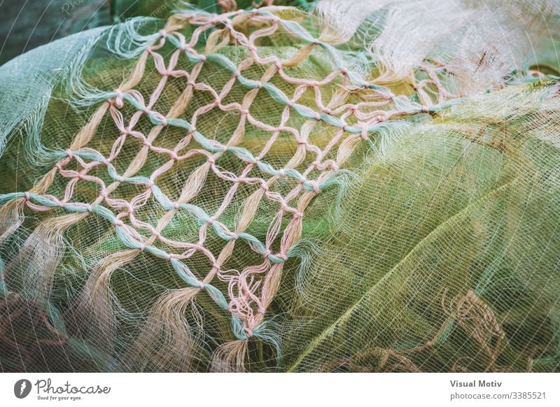 Makramee-Knoten, die ein zerknittertes Tuch schmücken Gewebe Textur texturiert Mode Hintergrund Oberfläche Design abstrakt Nahaufnahme niemand Detailaufnahme