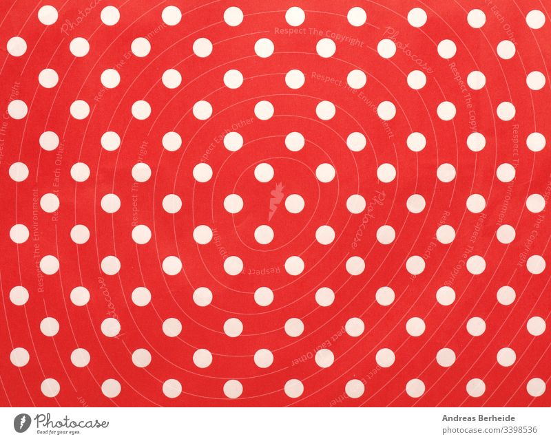 Papiertextur mit weißen Punkten auf Rot als Hintergrund Bild Punktmuster texturiert einfach Material Detailaufnahme Feiertag Reihe Deckung modern Verpackung