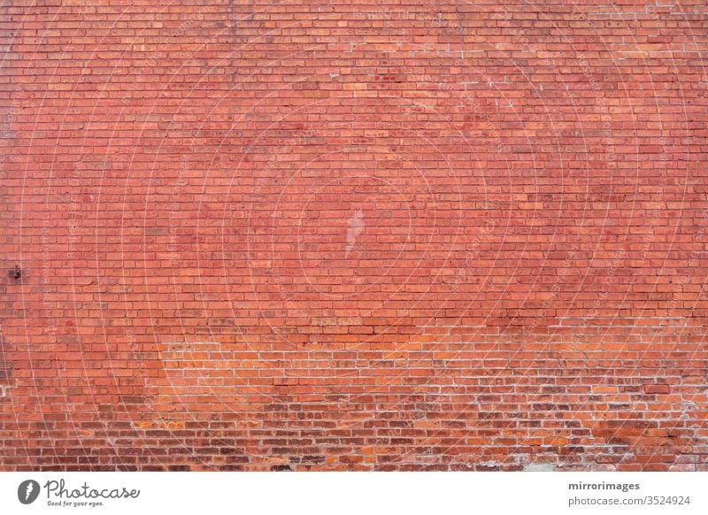 Fernes Gebäude rote Ziegelwand Oberfläche Körper Hintergrund volle Wand entfernte Ziegelmauer Gebäude rote Backsteinmauer Maurerhandwerk texturiert Raum