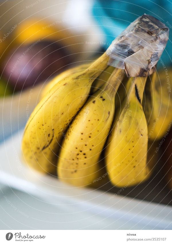 Bananen Frucht Zitrone Passionsfrucht Schalen & Schüsseln Speise Küche gelb abschließen Gesundheit Vitamin Nahaufnahme Zitrusfrüchte Farbfoto Ernährung Kalk