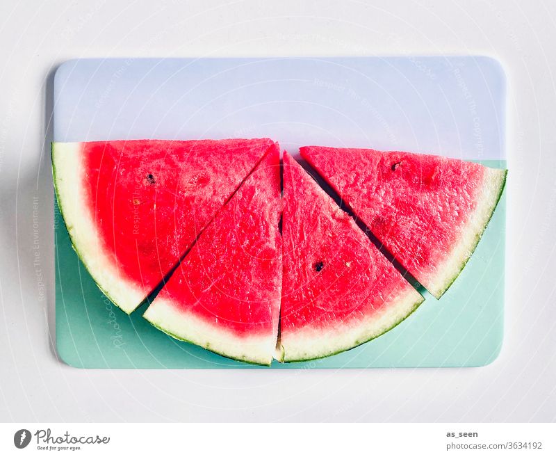 Wassermelone pink rosa türkis weiss frisch Sommer schön weiß lecker süß Kerne erfrischend heiß Melone rot Lebensmittel Frucht Gesundheit saftig Farbfoto Melonen
