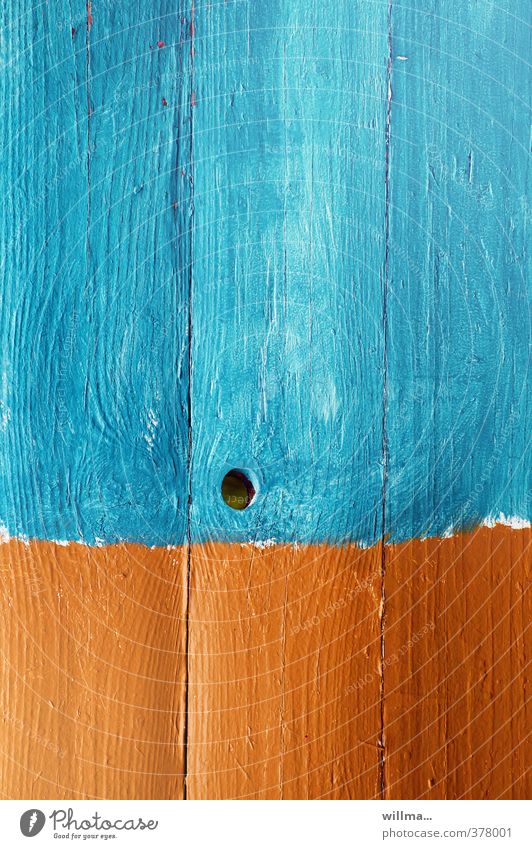 grafisch | ein wasserloch. Holz orange türkis Kreativität Farbe Farbenwelt Astloch Maserung Holzwand Bretterzaun graphisch Farbfoto Außenaufnahme Menschenleer