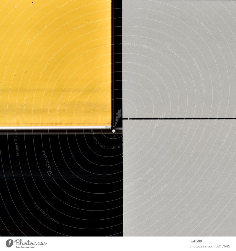 gelbes Rollo mit schwarzem und grauen Fassadenelementen minima Minimalismus Fassadenverkleidung Architektur abstrakter Hintergrund abstraktes Design