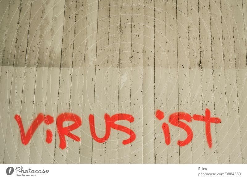 Rotes Graffiti an der Wand - (Corona) Virus ist Wut rot Schrift Coronavirus Corona-Virus Signalfarbe Infektionsgefahr bedrohlich Angst Schriftzug
