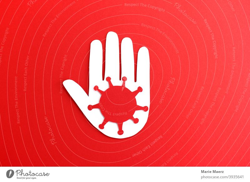 Vorsicht Corona - Illustration einer Hand mit rotem Corona-Virus Symbol corona Symbole & Metaphern Grafik u. Illustration Papierschnitt rosa Warnung Stop