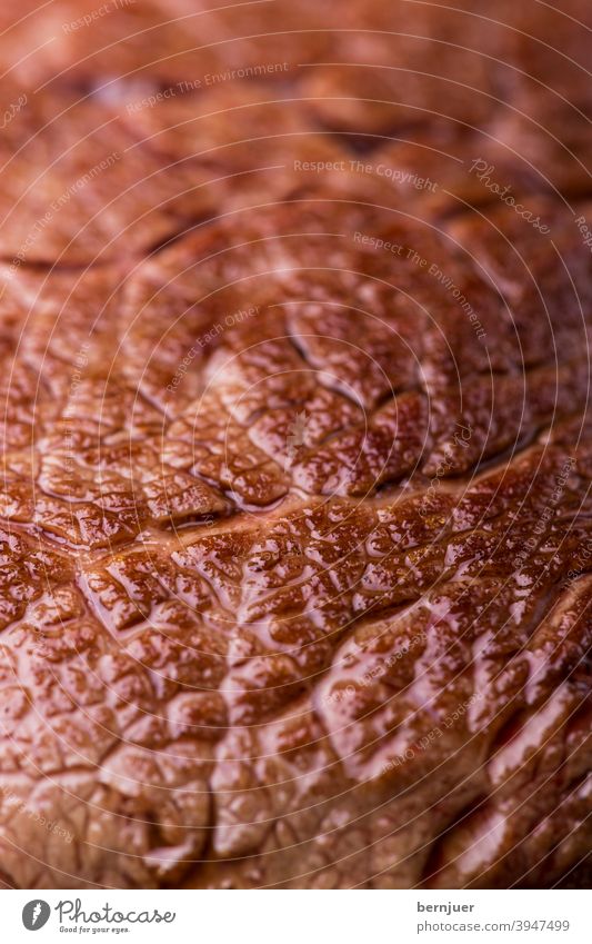 Nahaufnahme eines gegrillten Steaks Fleisch Textur Grillfleisch Hintergrund Makro Top Holz Blick Essen Brett Wein Sirloin gekocht Filet rot geschnitten