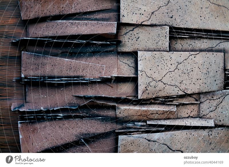 Wandmuster Muster Textur Hintergrund Stein Struktur Felsen Architektur Granit Haus abstrakt heimwärts modern rau solide Klotz Zement Konstruktion Oberfläche