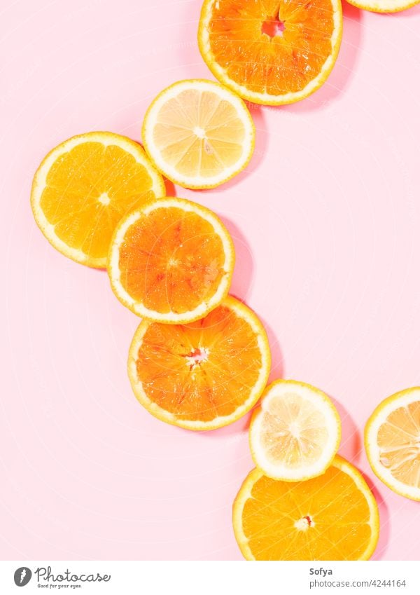 Bunte Orange Zitrusscheibe Obst Textur Hintergrund auf Pastell rosa orange Zitrusfrüchte Scheibe frisch gelb weiß Frucht Pastellfarbe Lebensmittel Muster