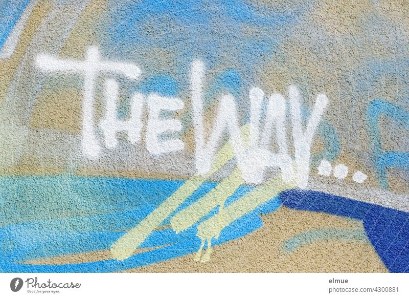 THE WAY ...   ist in weiß an eine Graffitiwand gesprüht / Graffito / Jugendkultur / Orientierung the way der Weg englisch blau Wand sprayen sprühen