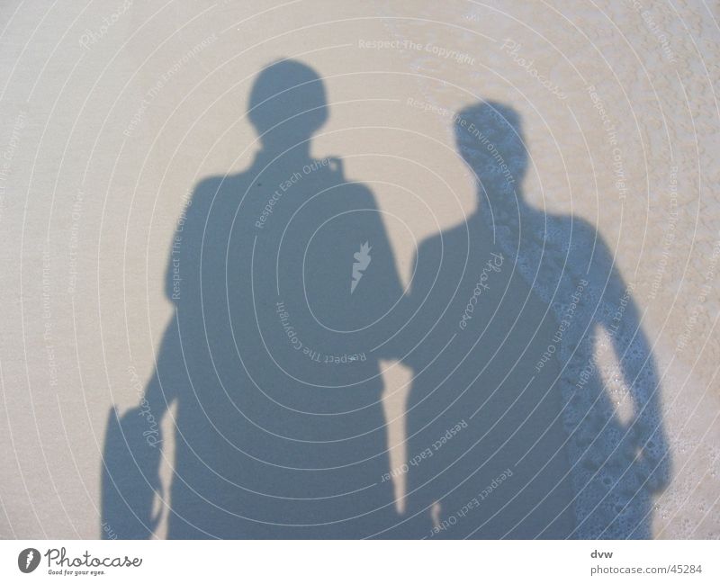 Schattenmänner Schattenspiel Pensacola Strand Selbstportrait Physik Meer Wellen Mann weisser Sand Sonne Wärme