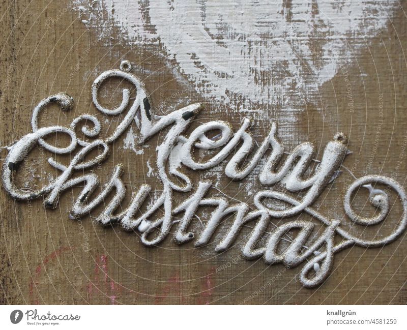 Schriftzug mit Schnörkel Merry Christmas Kitsch weihnachtlich kitschig Buchstaben wort Satz Text Wort Schriftzeichen Typographie Menschenleer Kommunikation