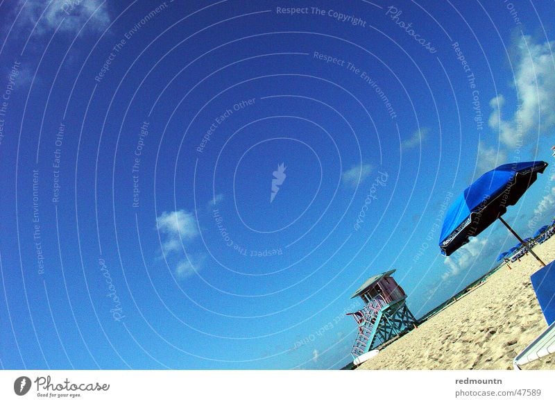 Miami Beach Amerika Strand Sonnenschirm Meer Erholung genießen Ferien & Urlaub & Reisen Urlaubsstimmung USA Sand Schwimmen & Baden blau Freude