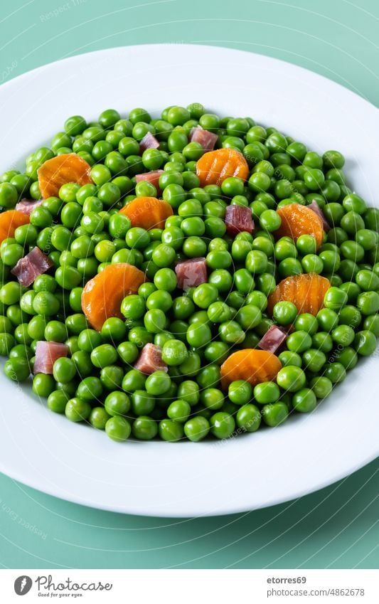 Grüne Erbsen, Serranoschinken und Karotten Möhre gekocht Abendessen Lebensmittel grün Schinken Gesundheit Mittagessen mischen Spanisch Gemüse