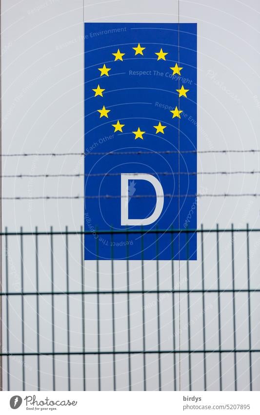 Eu - Länderkennung mit einem D für Deutschland hinter einem Zaun mit Stacheldraht Europäische Union deutschland EU-Kennung Zeichen Symbol EU-Mitglied Europa