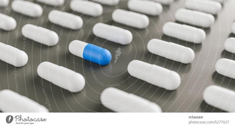blau und weiß Pillen oder Kapseln liegt in Reihen, Medizin Tabletten Antibiotikum, Apotheke Thema Kapsel-Hintergrund Apotheker Schmerz medizinisch Verschreibung
