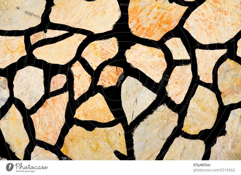 Mediterane Steinmauer in Nahaufnahme mediteran Italien Fassade alt Strukturen & Formen Mauer Wand Hintergrund Muster Detailaufnahme Architektur orange Farbfoto