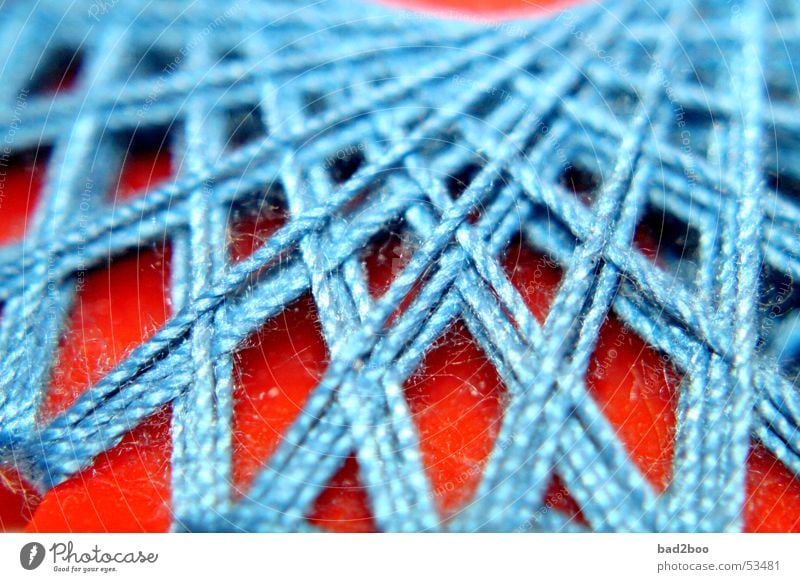 Zwirn 02 Nähgarn Nähen Stoff binden Schnur gekreuzt Faser gewebt Textilien Material Naht Stern (Symbol) wickeln blau orange Spinne spinnen genäht thread yarn