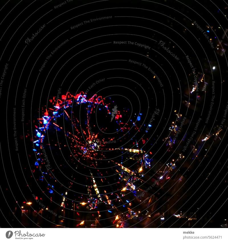 Glitzerriesenrad Riesenrad Jahrmarkt Nacht Licht Freude dunkel mehrfarbig Fahrgeschäfte Feste & Feiern drehen Attraktion groß Schwindelgefühl Vergnügungspark