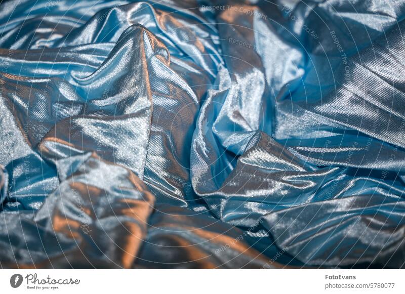 Glänzender hellblauer Stoff Muster Textfreiraum hell-blau Konzept Hintergrund Struktur Hintergründe glänzend Monochrom Textil schimmern Material Gewebe