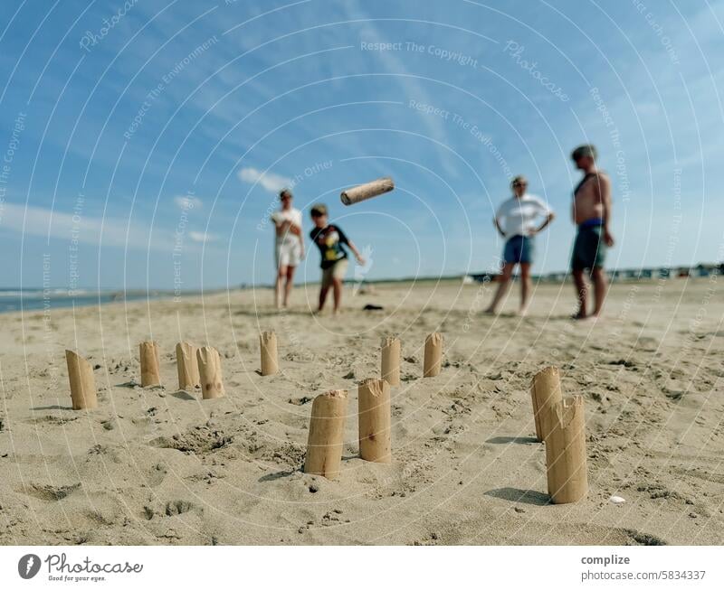 Mölkky strand spiel werfen familie holland spaß wurfspiel