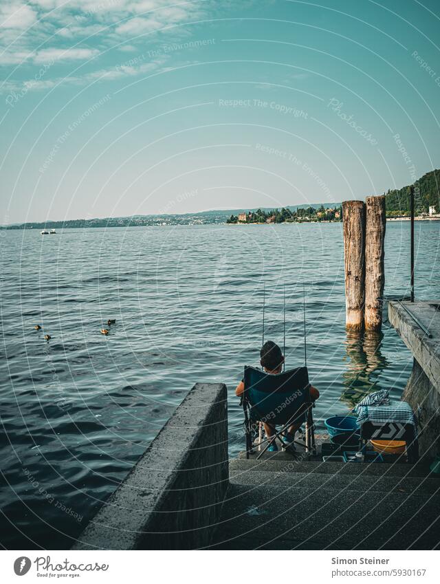 Angler am Gardasee in Italien See Morgendämmerung Wasser ufer