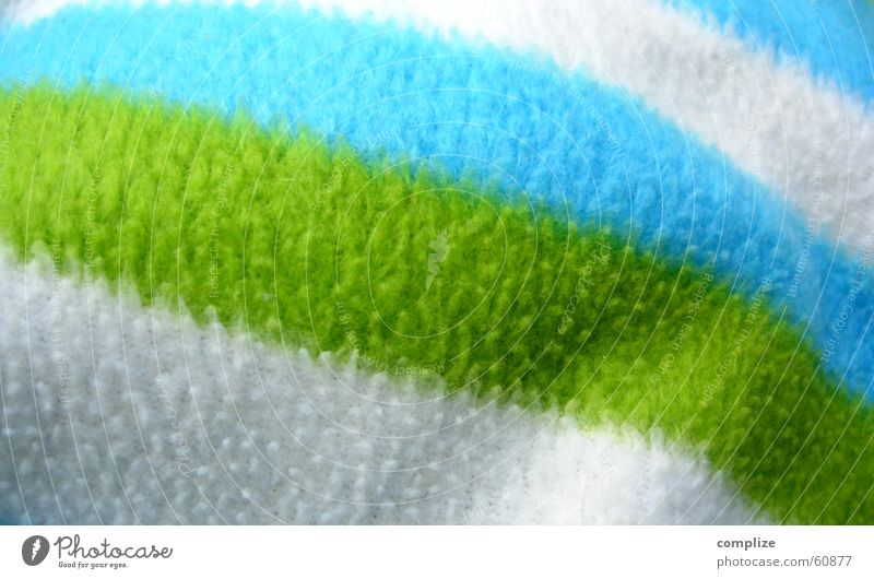 weissundgrünundblau Wolle Plüsch weich kuschlig Bettdecke heimelig Decke Farbe Wolldecke gestreift Nahaufnahme Detailaufnahme Menschenleer Textfreiraum