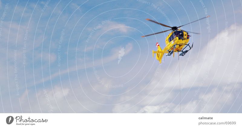 - rettungsflug - Hubschrauber Helfer Schweben gelb rettungsheli Himmel Hilfsbereitschaft Suche rettungsseil fliegen eurocopter ec135