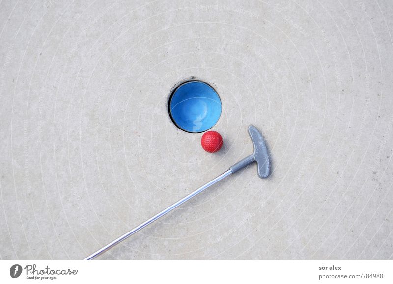 Niemals aufgeben Minigolf Golfschläger Golfball Golfplatz Wirtschaft Karriere Erfolg Spielen Sport blau grau rot Genauigkeit Konkurrenz planen Präzision Freude