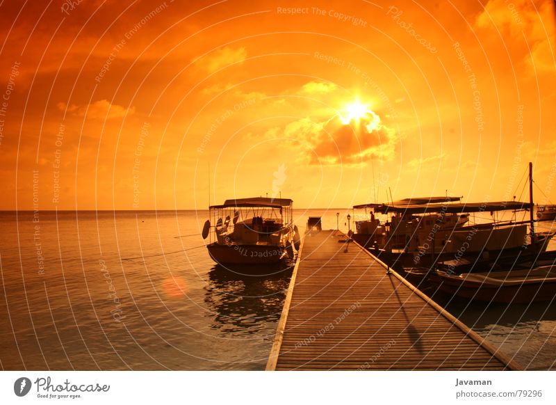sunset v² Meer Sonnenuntergang Wasserfahrzeug Aussicht Licht Physik heiß Steg Strand Küste Insel Wärme