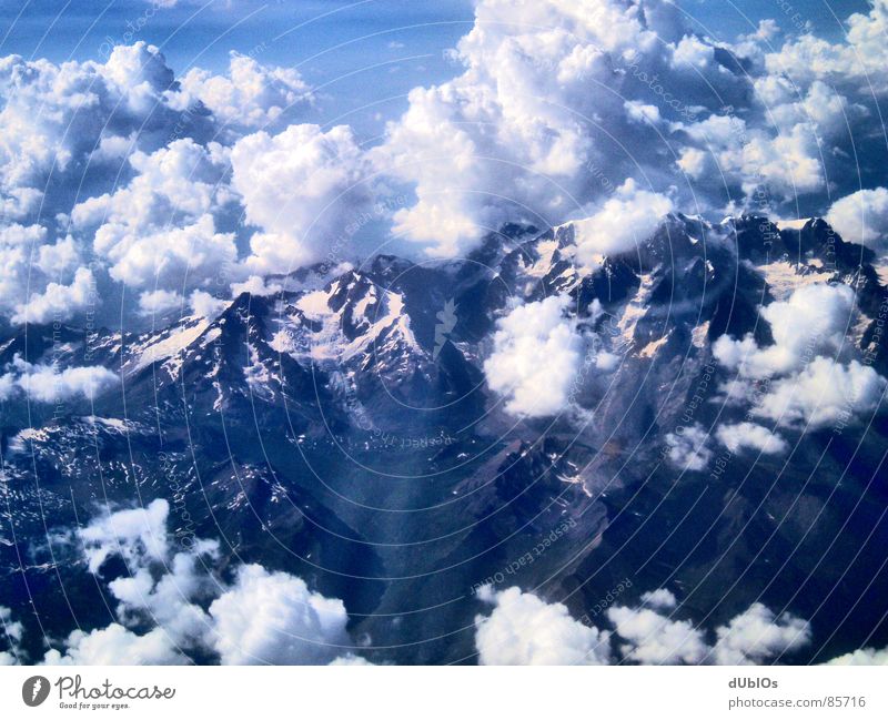 Die Alpen Bild 1 Österreich Flugzeug Wolken Vogelperspektive Himmel Berge u. Gebirge Schnee