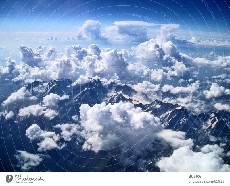Die Alpen Bild 2 Österreich Flugzeug Wolken Vogelperspektive Himmel Berge u. Gebirge Schnee