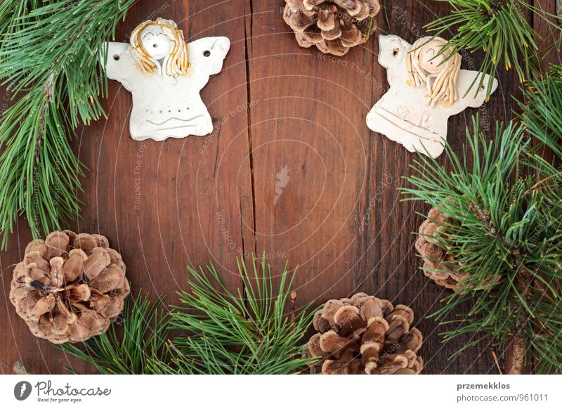 Weihnachtsdekoration Lifestyle Dekoration & Verzierung Holz Ornament Herz Engel authentisch einzigartig natürlich braun grün Tradition Textfreiraum Dezember