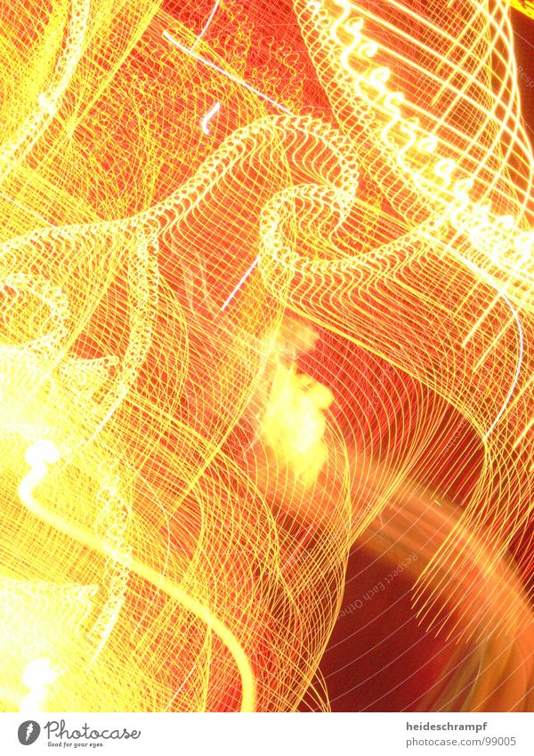 elektrische Lichter Parade Elektrizität gelb Farbe orange schlangenförmig durcheinander chaotisch abstrakt Lichtspiel Lichtdesign Lichtkunst Kunstlicht